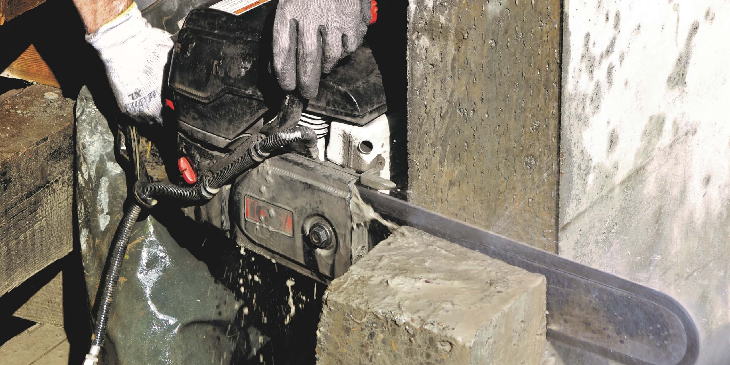 Cutting Concrete with a Diamond Chainsaw Cutting Concrete with a Diamond Chainsaw